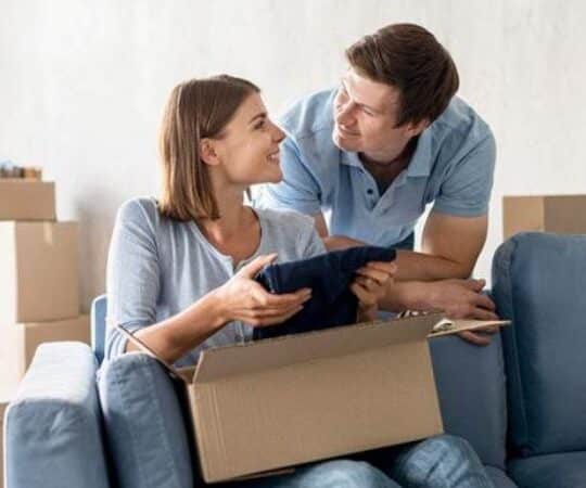 Happy Couple Moving
